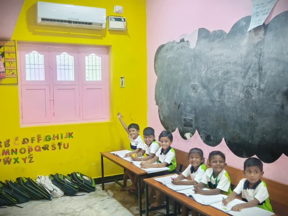 Children practising handwriting at their desks