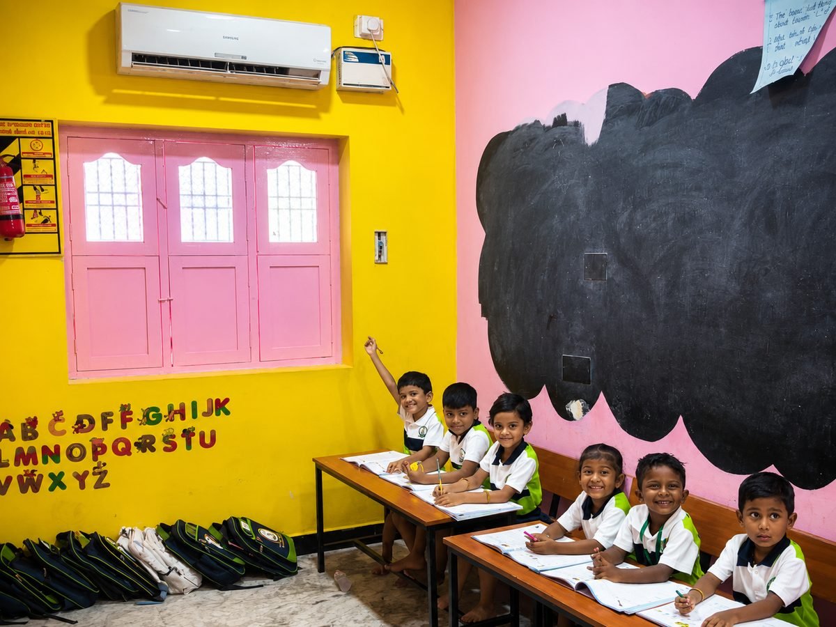 Bright, clean classroom with sanitized desks at BM Vidyashram