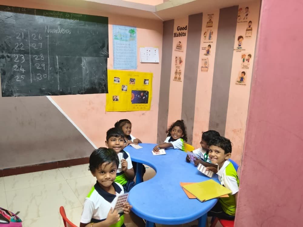 Children learning number and language cards